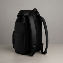 Load image into Gallery viewer, Black backpack on a light gray background
