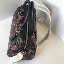 Load image into Gallery viewer, Black handbag with red cherry pattern on a white background