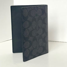 Load image into Gallery viewer, Black leather wallet with pattern on a white background