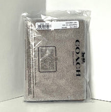 Load image into Gallery viewer, Coach wallet in packaging on a white background