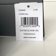 Load image into Gallery viewer, Product tag with barcode and text on a gray background