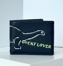 Load image into Gallery viewer, Black wallet with white and green text and design on a light background