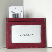 Load image into Gallery viewer, Red Coach cardholder with a white label on a light gray background