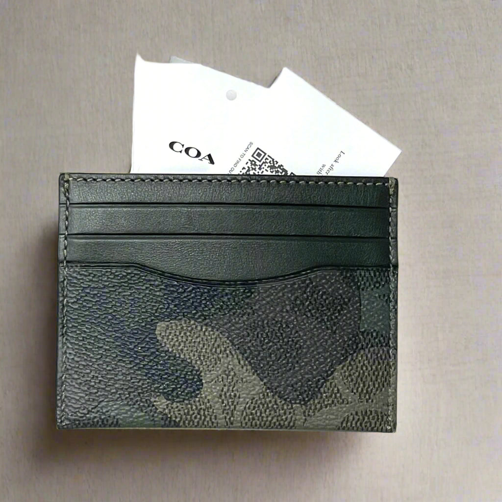 Camouflage patterned cardholder with a white background