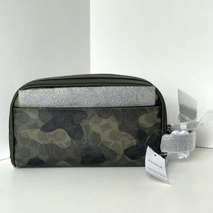 Camouflage patterned toiletry bag with a silver interior on a white background