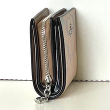 Load image into Gallery viewer, Beige wallet with a zipper on a white background