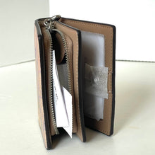 Load image into Gallery viewer, Brown leather wallet with a zipper on a white background