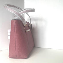 Load image into Gallery viewer, Pink handbag with a visible brand logo on a white background