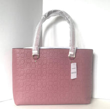 Load image into Gallery viewer, Pink handbag with a white handle on a light gray background