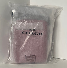 Load image into Gallery viewer, Coach bag in clear plastic packaging on a white background