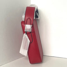 Load image into Gallery viewer, Red handbag with silver bow detail on a white background