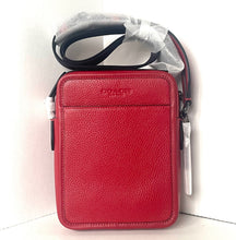 Load image into Gallery viewer, Red leather crossbody bag with a strap on a white background