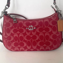 Load image into Gallery viewer, Red Coach handbag with a visible brand tag on a white background