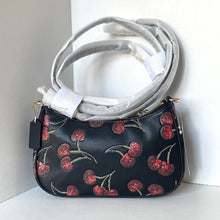 Load image into Gallery viewer, Black handbag with red cherry design on a white background
