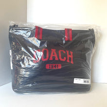 Load image into Gallery viewer, Coach bag with red text and logo in clear plastic packaging on a white background