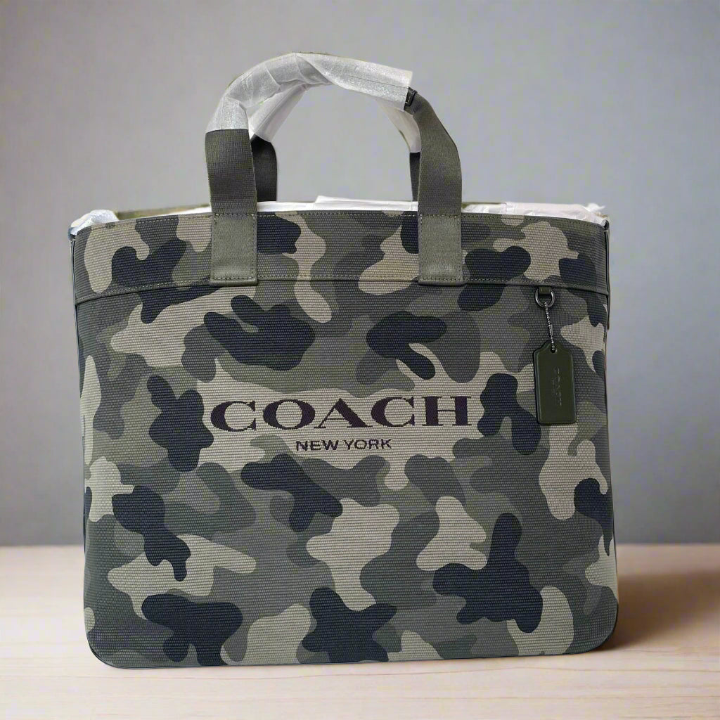 Camouflage-patterned Coach bag on a white background