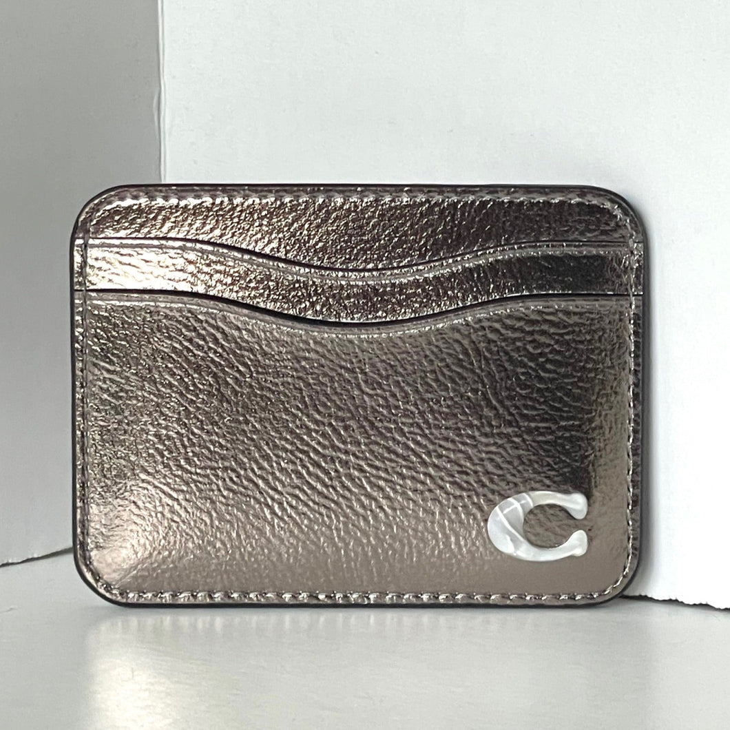 Metallic cardholder with a brand logo on a white background
