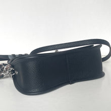 Load image into Gallery viewer, Black leather handbag with a strap on a white background