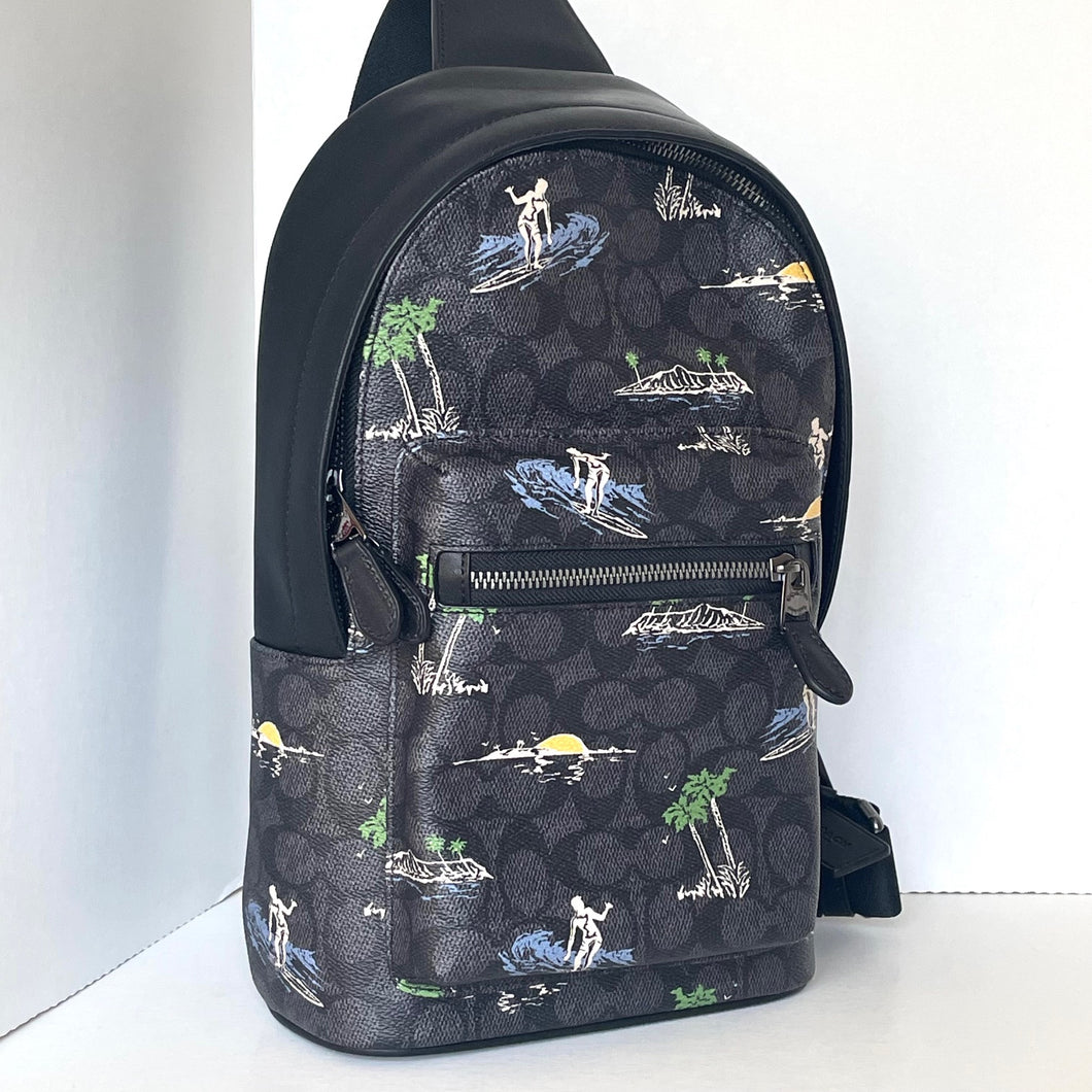 Black backpack with tropical pattern on a white background