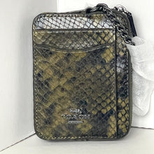 Load image into Gallery viewer, Coach handbag with snake print pattern on a white background