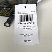 Load image into Gallery viewer, Product tag with barcode and text on a surface