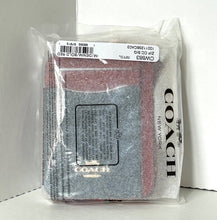 Load image into Gallery viewer, Coach wallet in packaging with visible branding