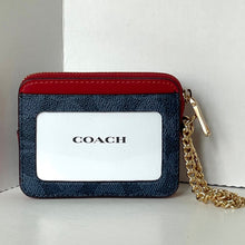 Load image into Gallery viewer, Coach wallet with red top section and gold chain on a white background