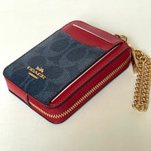 Load image into Gallery viewer, Red and blue Coach wallet with gold chain on a light background