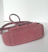 Load image into Gallery viewer, A dusty rose pink suede crossbody bag with a matching adjustable shoulder strap and silver-tone hardware, photographed on a plain white background.