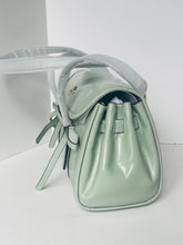 Load image into Gallery viewer, Mint green handbag with a strap on a white background