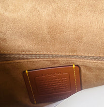 Load image into Gallery viewer, Close-up of a brown leather patch with stitching on beige fabric.
