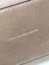 Load image into Gallery viewer, Close-up of a natural full grain leather surface with debossed text reading 'NATURAL FULL GRAIN LEATHER' and visible stitching along the edges.