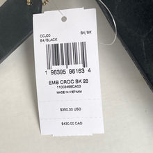 Load image into Gallery viewer, Product tag with barcode and pricing details on a light gray background