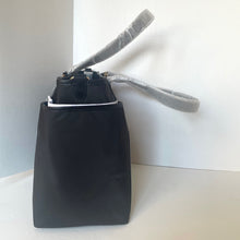 Load image into Gallery viewer, Black handbag with a gray strap on a white background