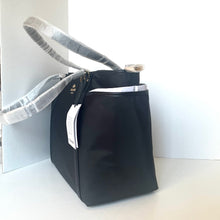 Load image into Gallery viewer, Black handbag with silver accents on a white background