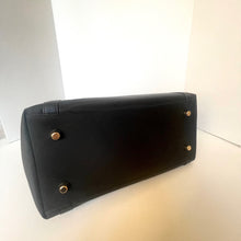 Load image into Gallery viewer, Black handbag with gold hardware on a white background