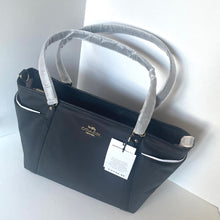 Load image into Gallery viewer, Black handbag with gray handles on a white background