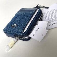 Load image into Gallery viewer, Blue Coach wallet with tags and box on a white surface