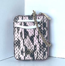 Load image into Gallery viewer, A small rectangular crossbody bag with a pink, black, and white snakeskin pattern, featuring a gold-tone chain strap and a white leather detail on the front.