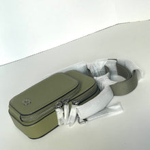 Load image into Gallery viewer, Green crossbody bag with a strap on a white background