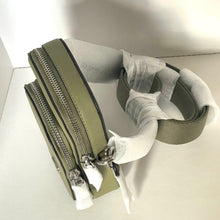 Load image into Gallery viewer, Green bag with multiple zippers on a white background