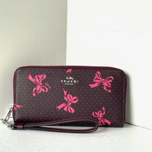 Load image into Gallery viewer, Coach CZ327 Pink Bow Zip Around Wallet Merlot Canvas Phone Wristlet