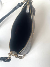 Load image into Gallery viewer, A close-up view of a gray leather shoulder bag with gold-tone hardware, showing the open top zipper and interior lining on a white background.