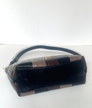 Load image into Gallery viewer, A black patent leather shoulder bag with brown and beige checkered accents and a gold-tone logo clasp, photographed on a plain white background.