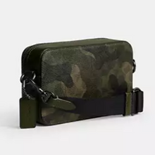 Load image into Gallery viewer, Camouflage-patterned pouch with a knife attachment on a white background