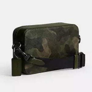 Camouflage-patterned pouch with a knife attachment on a white background