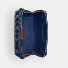 Load image into Gallery viewer, Blue wallet with patterned flap on a light gray background