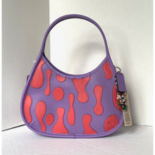Load image into Gallery viewer, Purple handbag with red pattern on a white background
