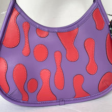 Load image into Gallery viewer, Purple handbag with red abstract patterns on a white background