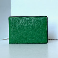 Load image into Gallery viewer, Green leather wallet on a white surface with a light gray background